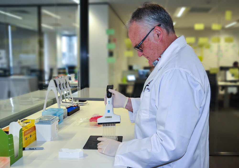 a photo of a myDNA scientist inside the laboratory