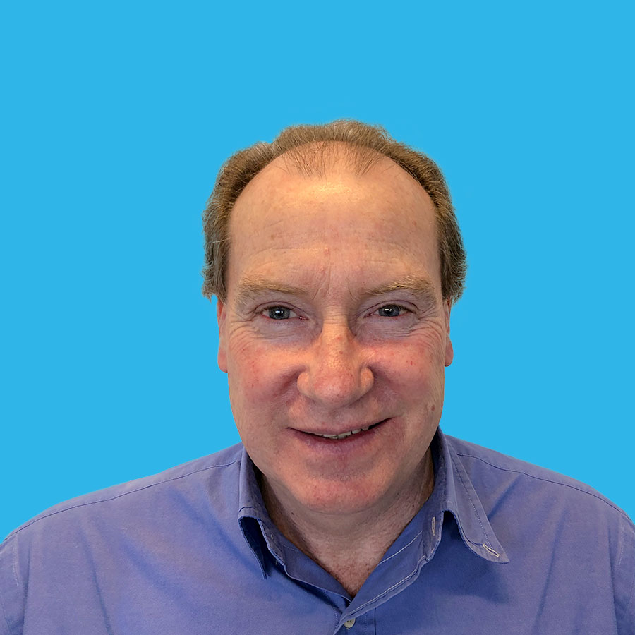 ian-hellier-portrait a portrait of Ian Hellier on a blue background
