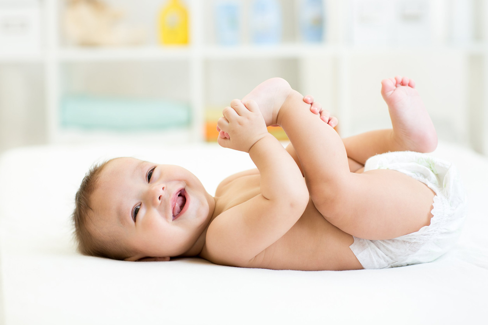 Baby's Spine and Mother's Folate (Vitamin B9) a smiling baby